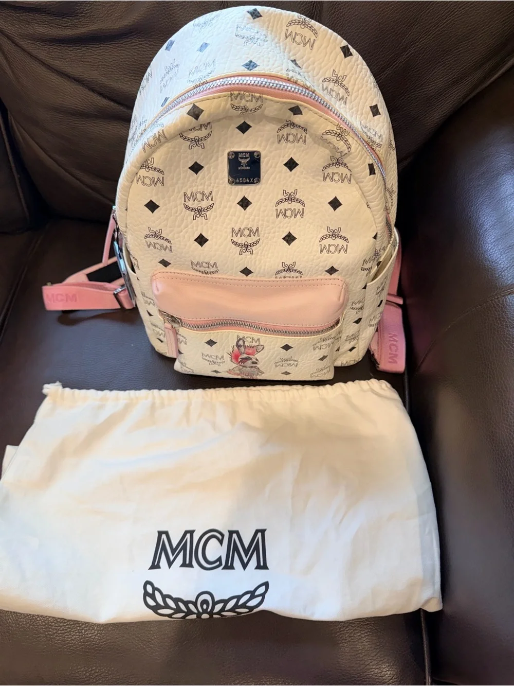 MCM White Backpack with Pink Front Pocket and Strap Accents